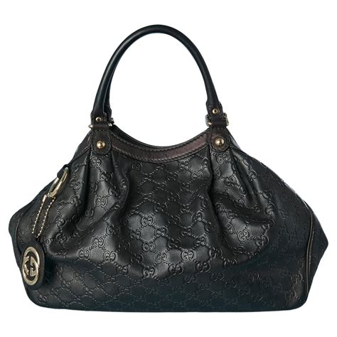 gucci embossed